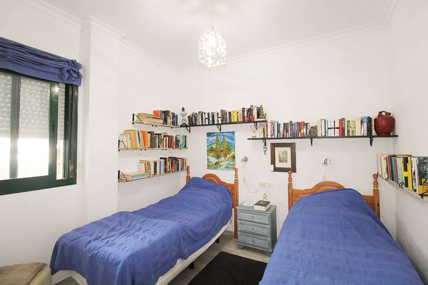 Apartamento en planta baja con terraza acristalada y piscina en Alhaurín Golf