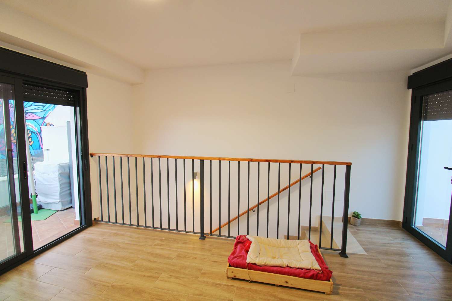 Exclusivo Dúplex de Obra Reciente en el Centro de Alhaurín con Gran Terraza y Vistas Abiertas